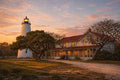 Ocracoke Lighthouse and keeper's quarters at sunset, gallery-wrapped photographic art canvas of the Outer Banks by Bobby Bryan Goodwin